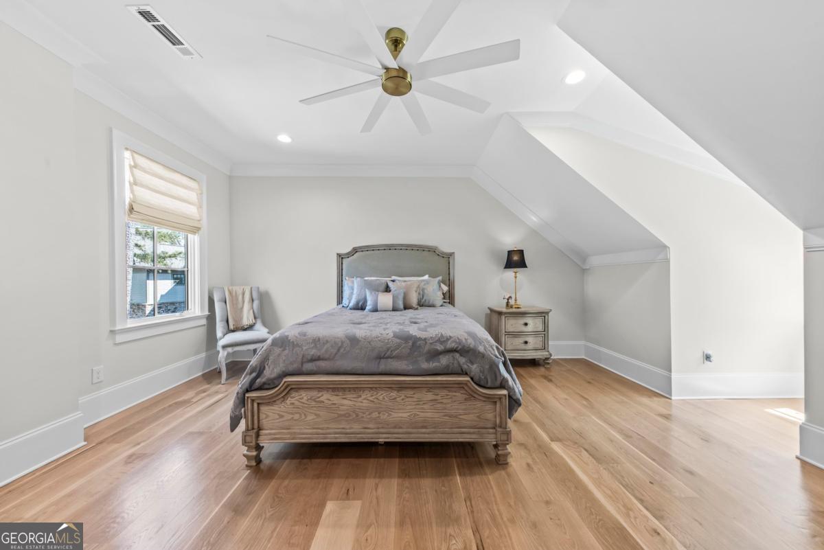 5010 Browns Ford Road Greensboro, GA 30642 - Photo 50 of 67 a bedroom with a bed and a window