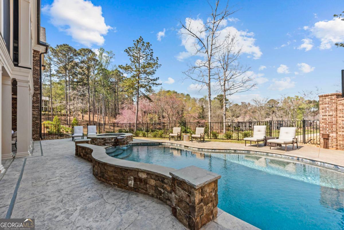 5010 Browns Ford Road Greensboro, GA 30642 - Photo 5 of 67 a view of a swimming pool with outdoor seating