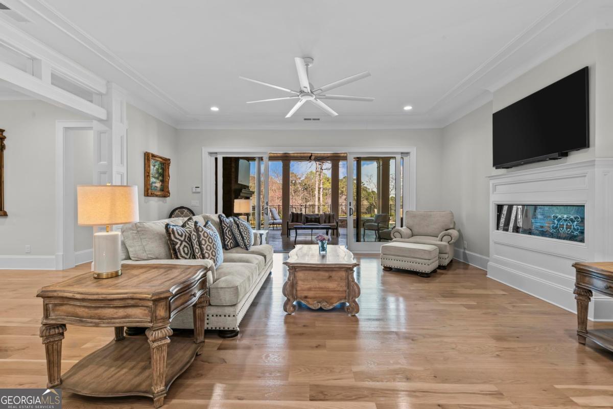5010 Browns Ford Road Greensboro, GA 30642 - Photo 56 of 67 a living room with furniture and a flat screen tv