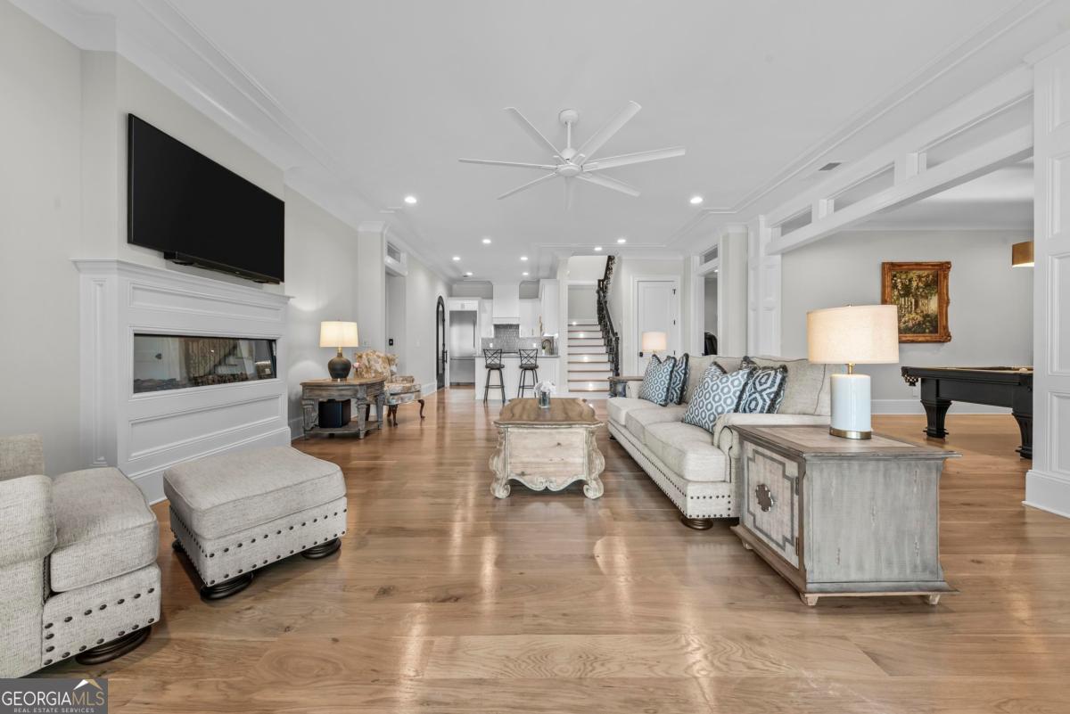 5010 Browns Ford Road Greensboro, GA 30642 - Photo 57 of 67 a living room with fireplace furniture and a flat screen tv