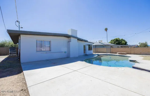 a house view with a backyard space