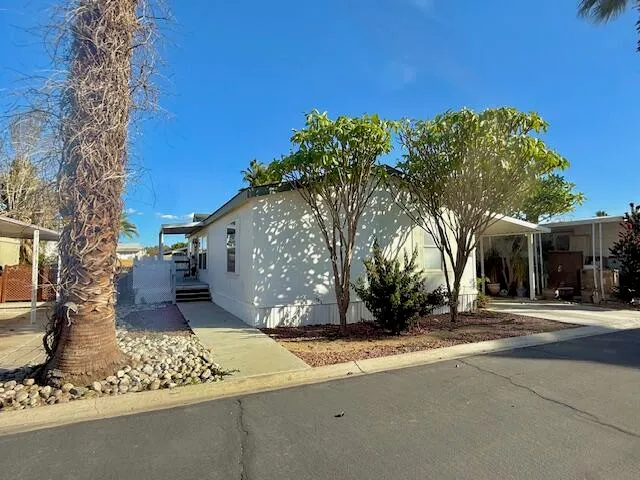 a view of a street with a building in the background