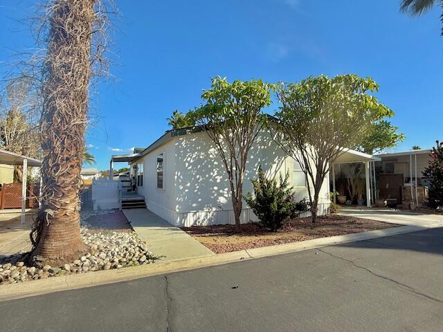 a view of a street with a building in the background