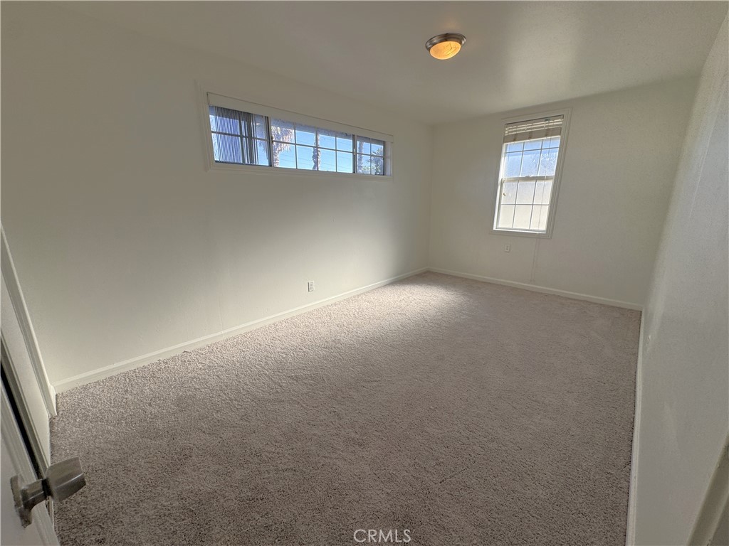 835 East Claude Street Carson, CA 90746 - Photo 15 of 20 an empty room with windows