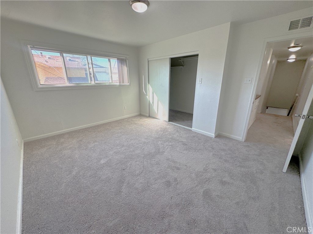 835 East Claude Street Carson, CA 90746 - Photo 16 of 20 an empty room with windows and closet