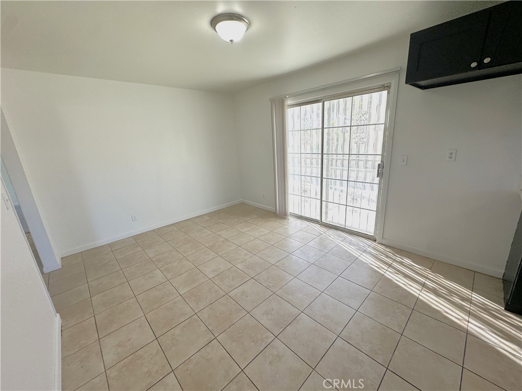 835 East Claude Street Carson, CA 90746 - Photo 7 of 20 an empty room with windows