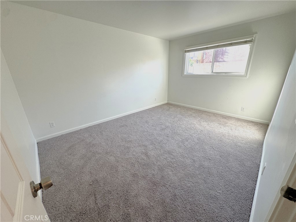 835 East Claude Street Carson, CA 90746 - Photo 9 of 20 an empty room with windows