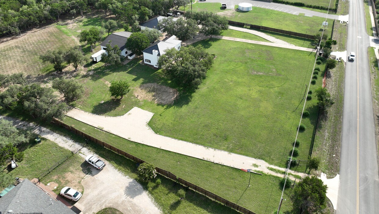 102 County Road 180 Leander, TX 78641 - Photo 4 of 25 Sprawling acreage provides ample space for privacy and future expansion.