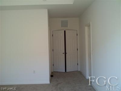 9803 Bodego Way, Unit 104 Fort Myers, FL 33908 - Photo 8 of 10 a view of an empty room