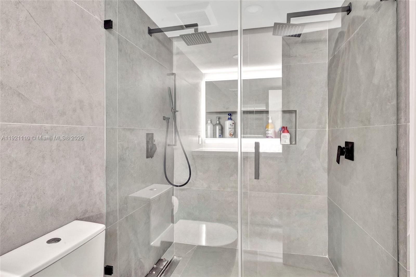 1627 Brickell Avenue, Unit 1202 Miami, FL 33129 - Photo 20 of 30 a bathroom with a shower