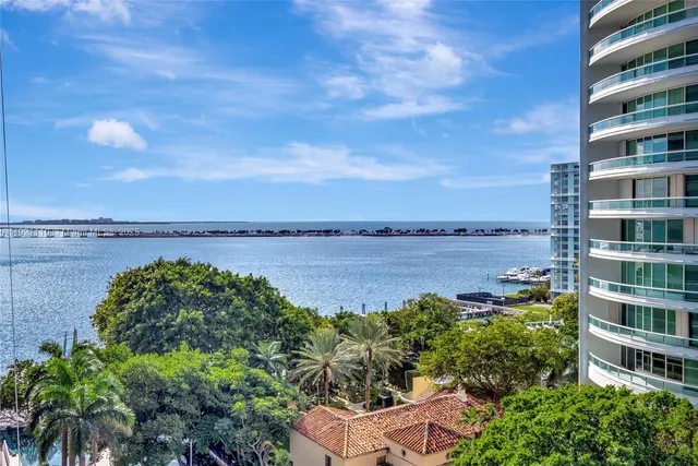 a view of a lake with a building in front of it