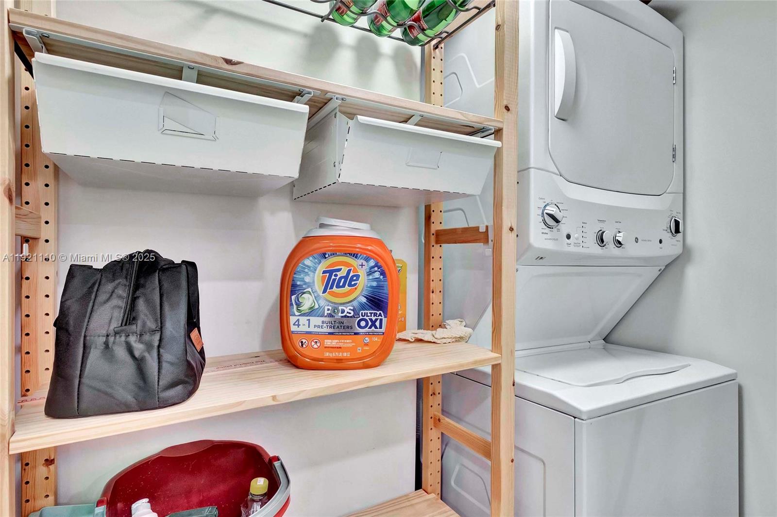 1627 Brickell Avenue, Unit 1202 Miami, FL 33129 - Photo 24 of 30 a view of washer and dryer