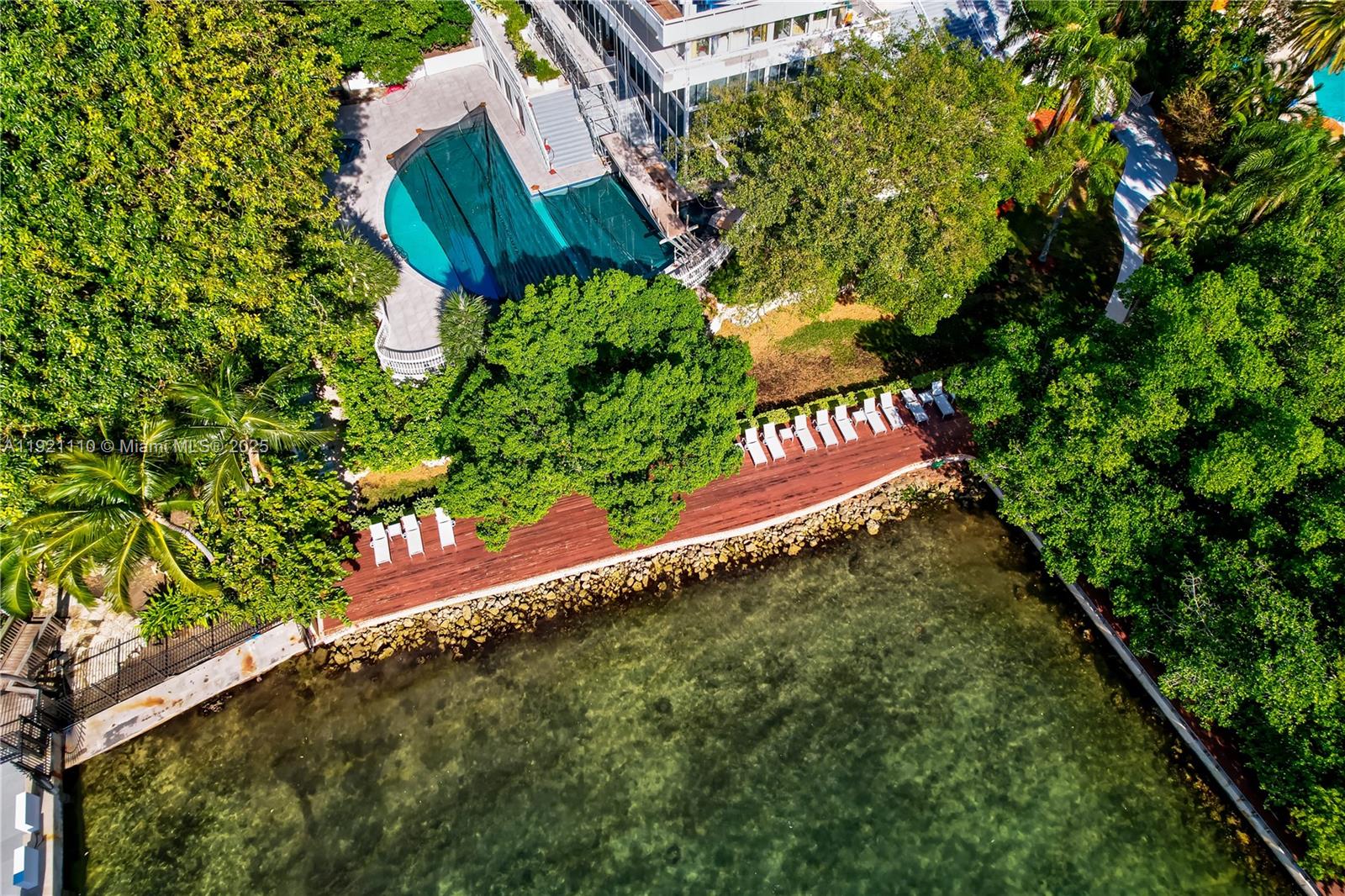 1627 Brickell Avenue, Unit 1202 Miami, FL 33129 - Photo 27 of 30 a view of a tree with a yard