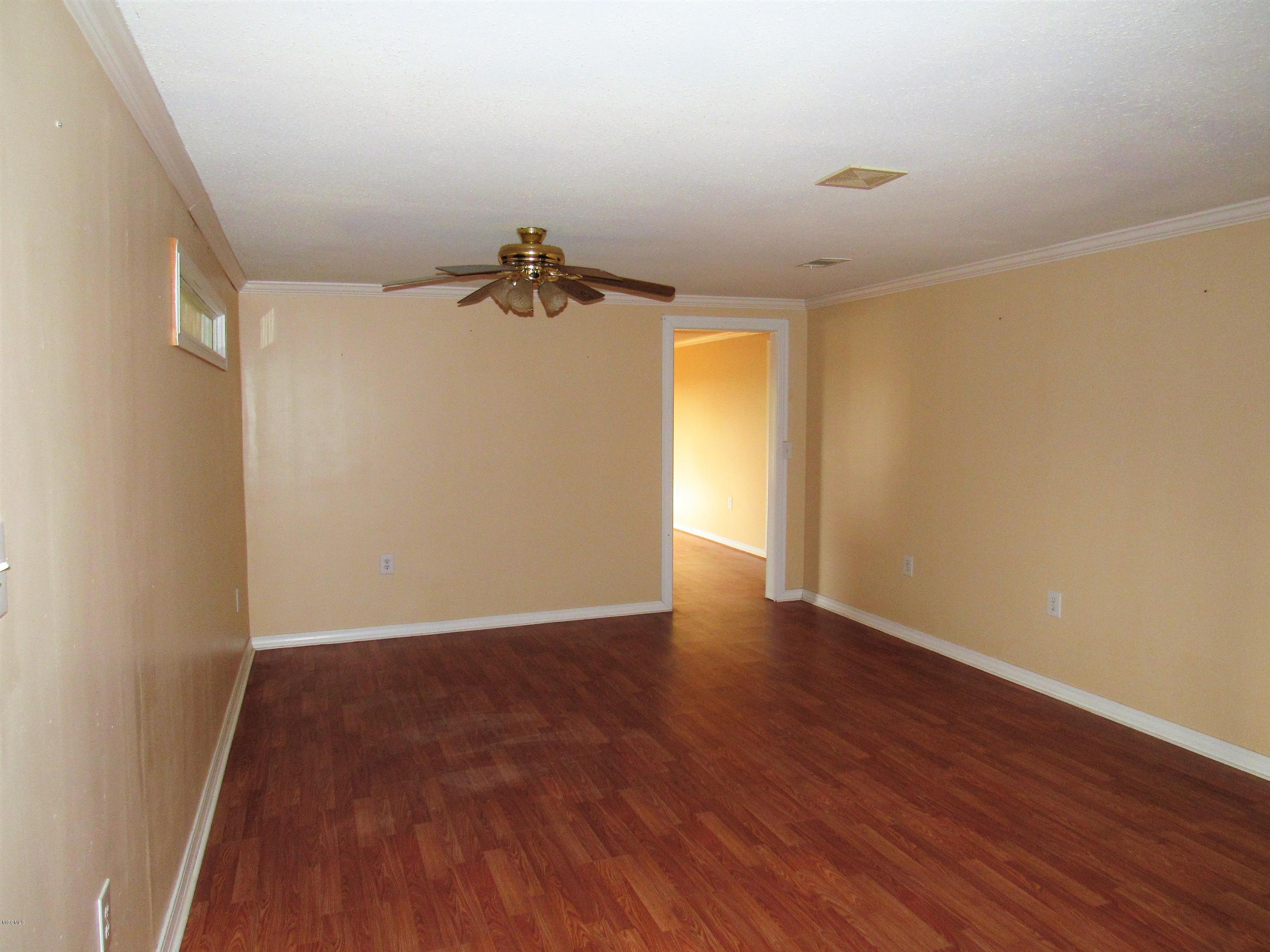 22208 Houston Ladner Road Saucier, MS 39574 - Photo 5 of 25 Den view 2
