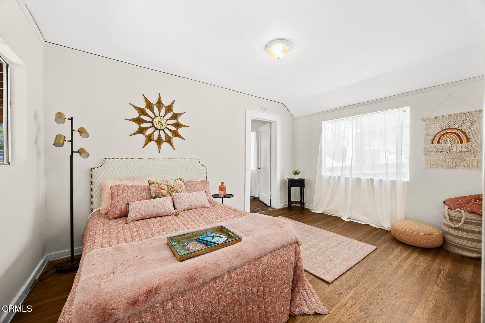 2724 Locksley Place Los Angeles, CA 90039 - Photo 18 of 34 a bedroom with a bed and wooden floor