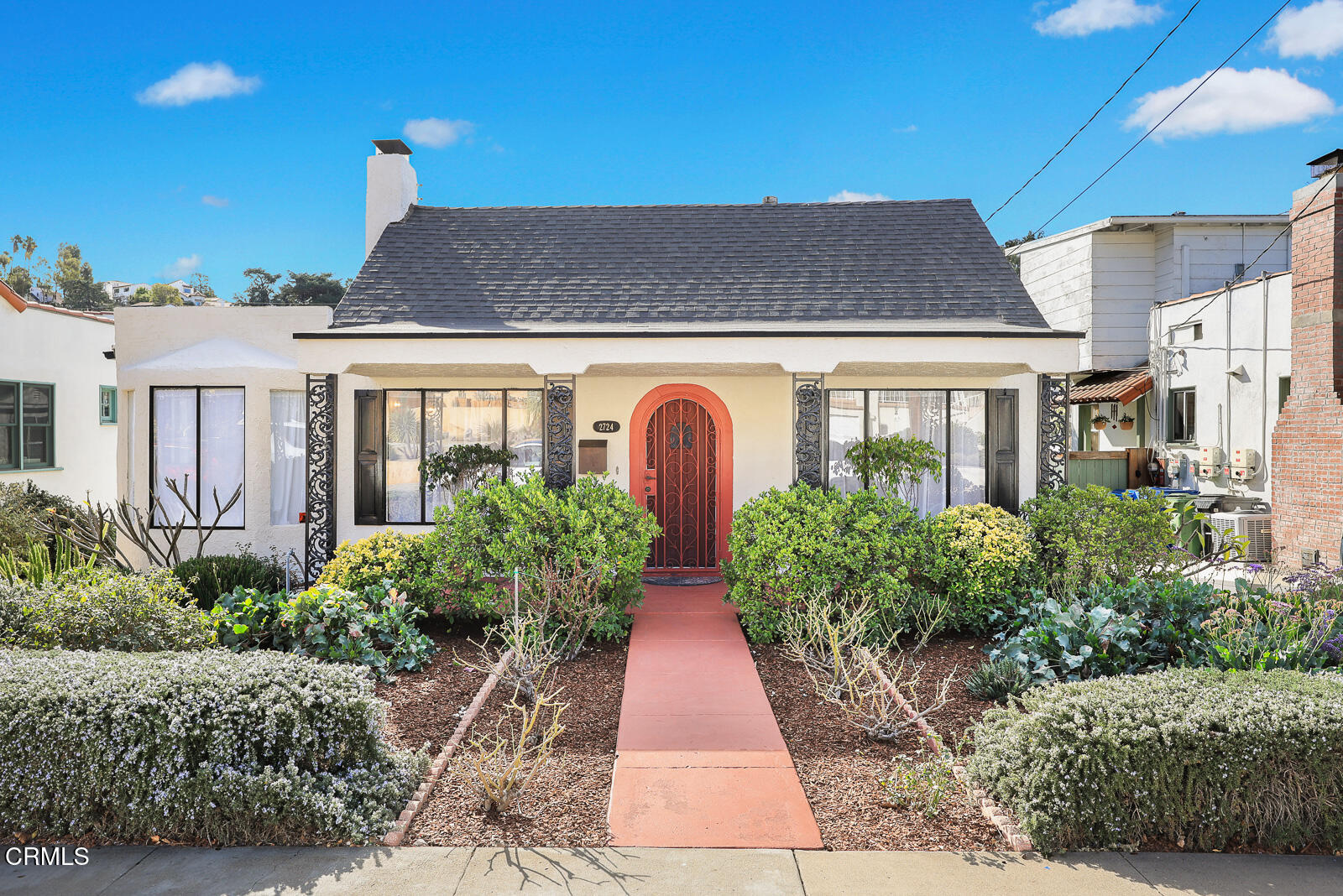 2724 Locksley Place Los Angeles, CA 90039 - Photo 2 of 34 a view of a brick house with potted plants