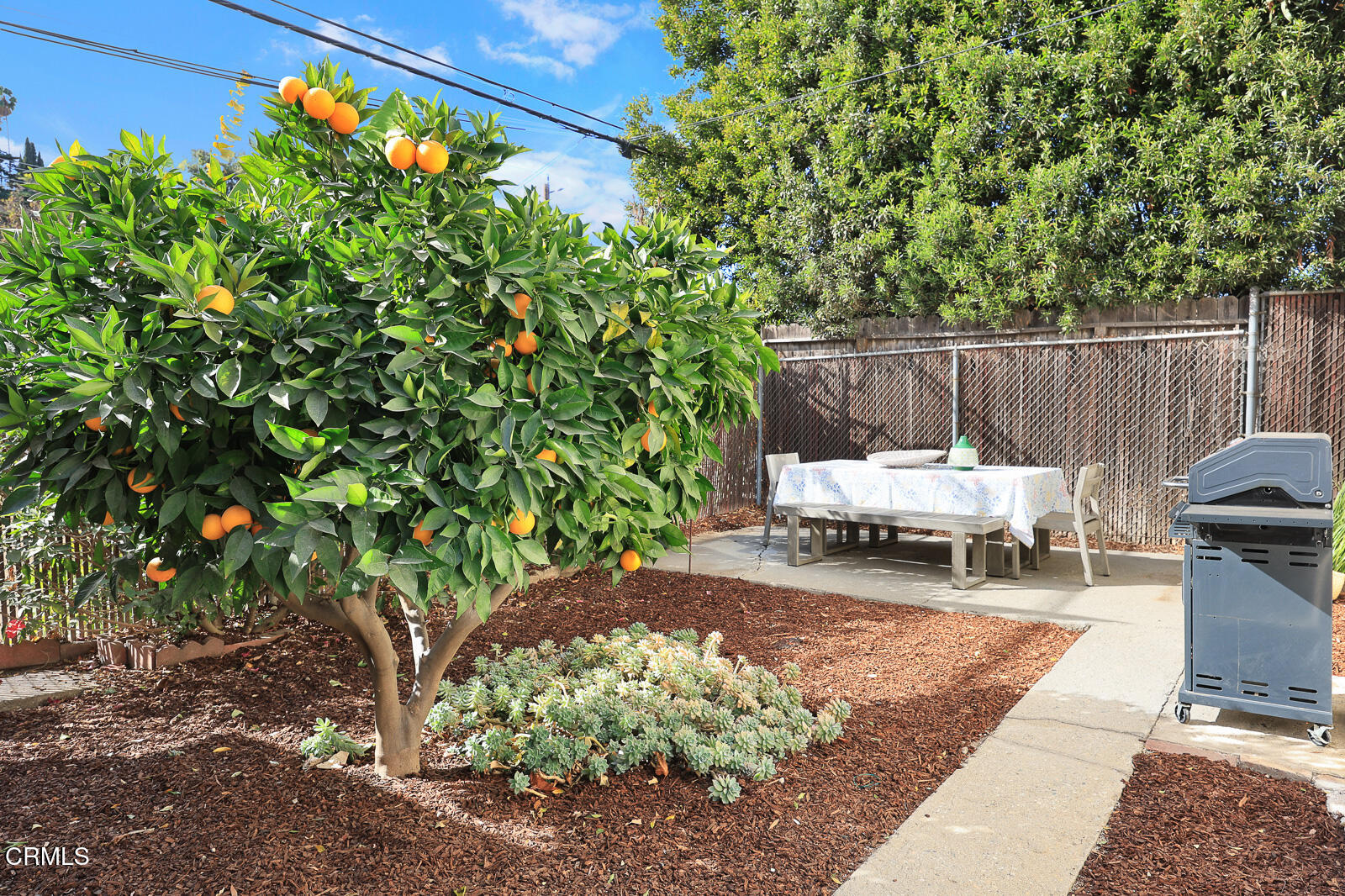 2724 Locksley Place Los Angeles, CA 90039 - Photo 28 of 34 a view of a chair and fire pit in the garden