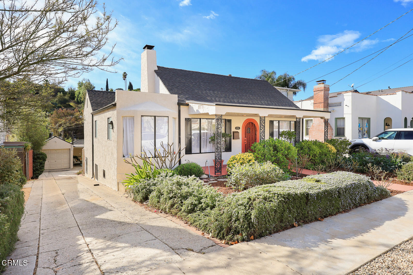 2724 Locksley Place Los Angeles, CA 90039 - Photo 3 of 34 a view of a house with a garden