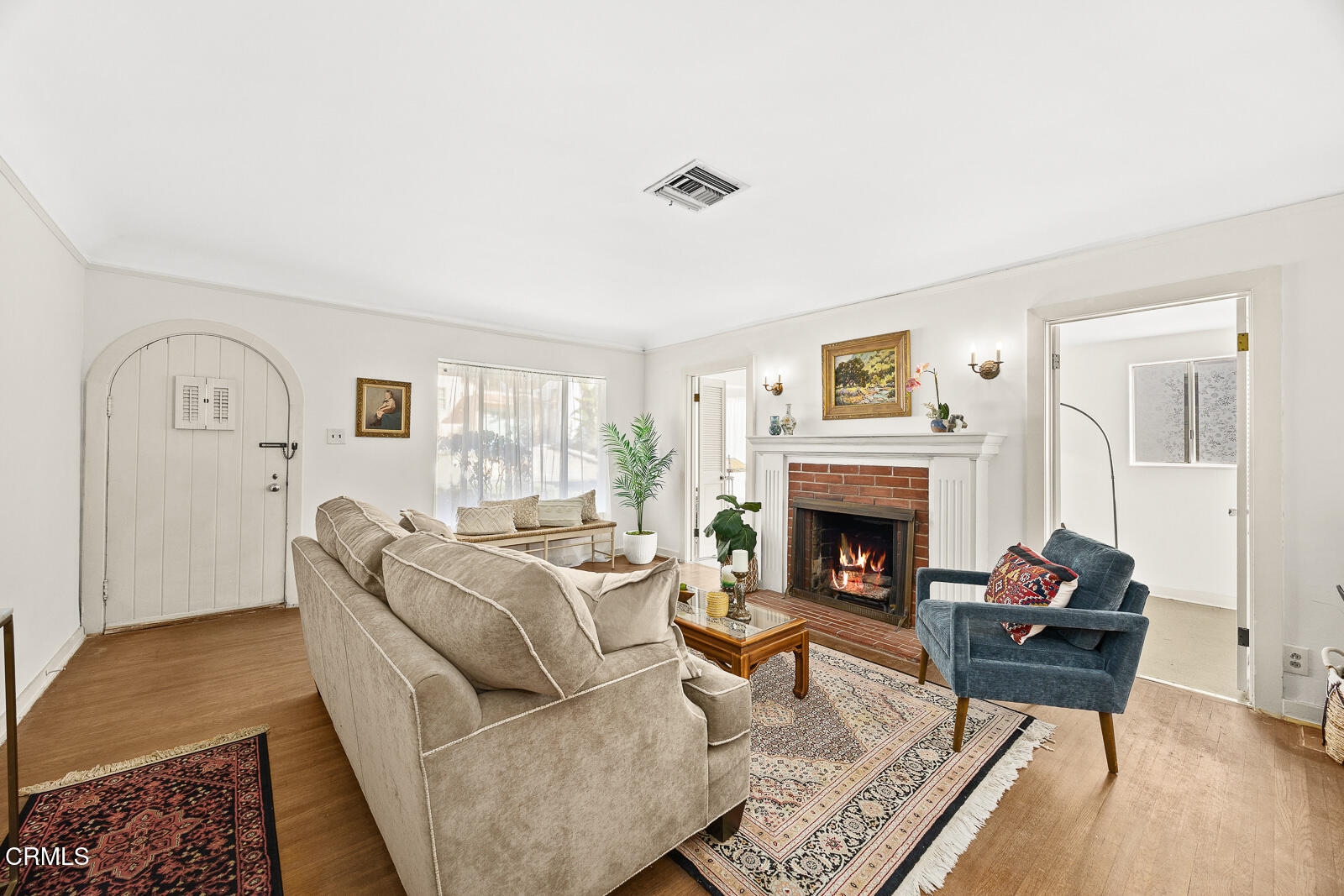 2724 Locksley Place Los Angeles, CA 90039 - Photo 9 of 34 a living room with furniture a fireplace and a table