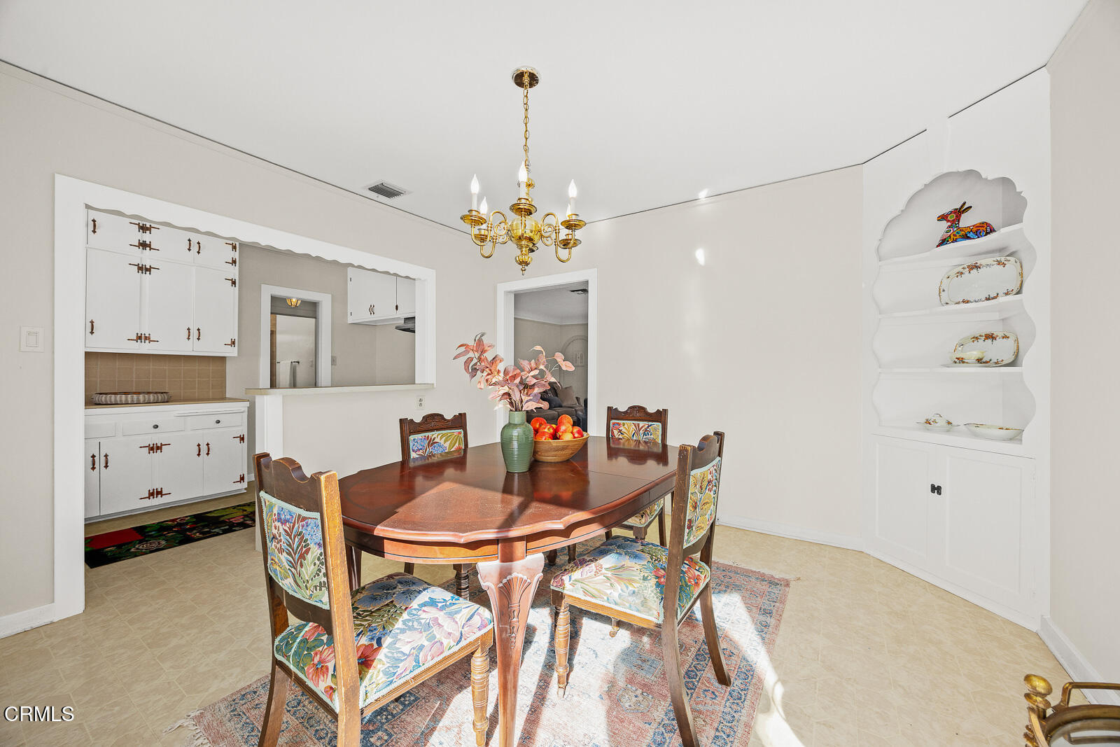 2724 Locksley Place Los Angeles, CA 90039 - Photo 10 of 34 a view of a dining room with furniture and chandelier