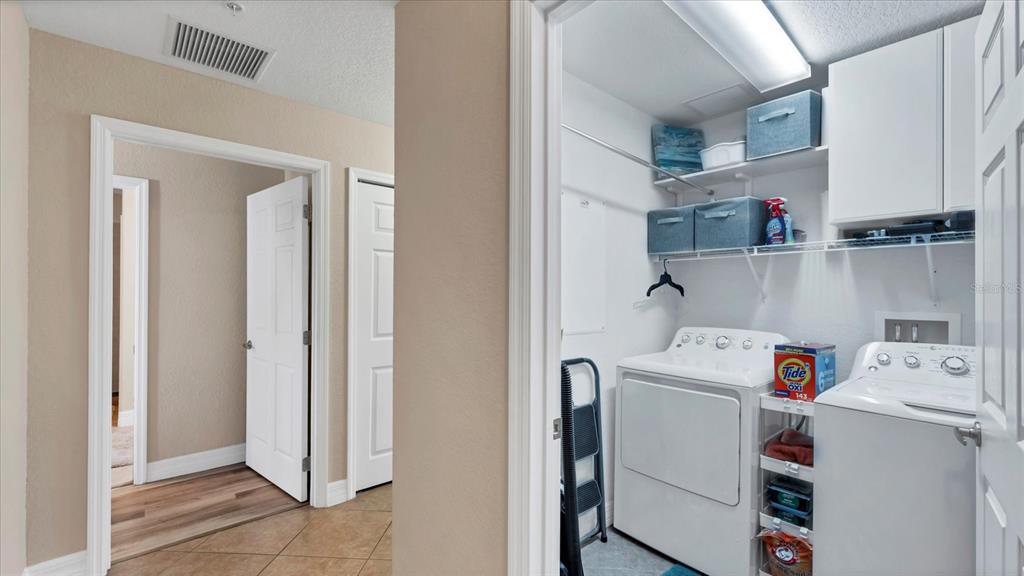 2245 North Beach Road, Unit 203 Englewood, FL 34223 - Photo 26 of 55 a utility room with dryer and washer