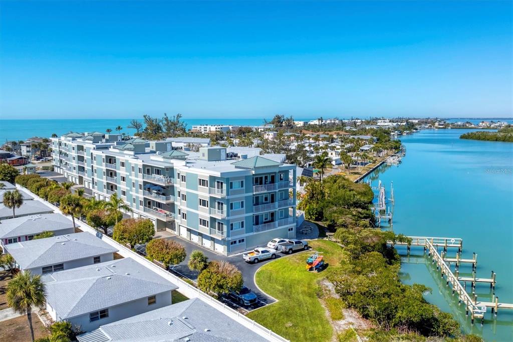 2245 North Beach Road, Unit 203 Englewood, FL 34223 - Photo 40 of 55 an aerial view of a house with a ocean view