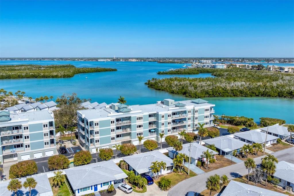 2245 North Beach Road, Unit 203 Englewood, FL 34223 - Photo 54 of 55 an aerial view of a house with a lake view