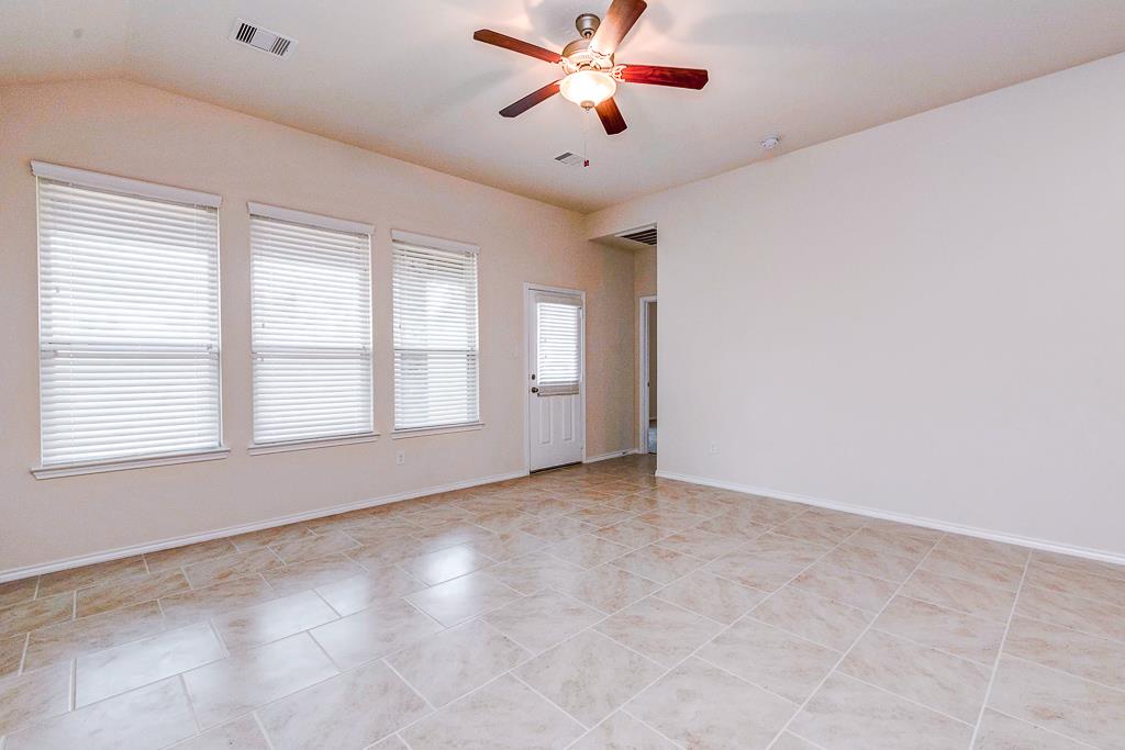 24314 North Newcastle Bay Trail Spring, TX 77389 - Photo 14 of 32 a view of an empty room with a window