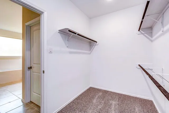 a view of small space with racks on the wall