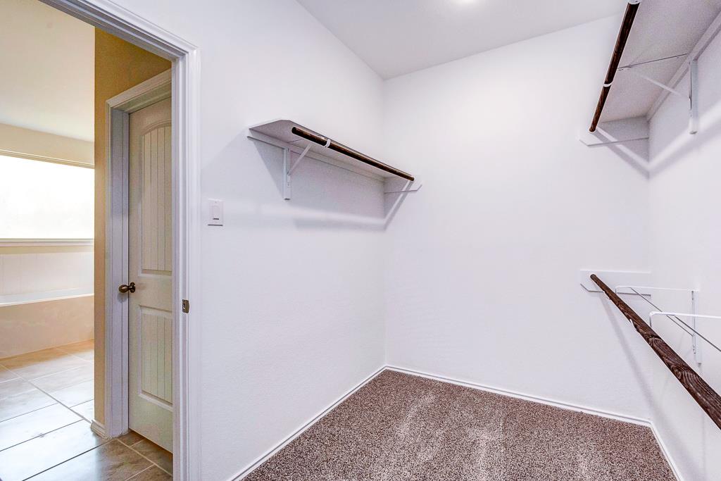 24314 North Newcastle Bay Trail Spring, TX 77389 - Photo 28 of 32 a view of small space with racks on the wall