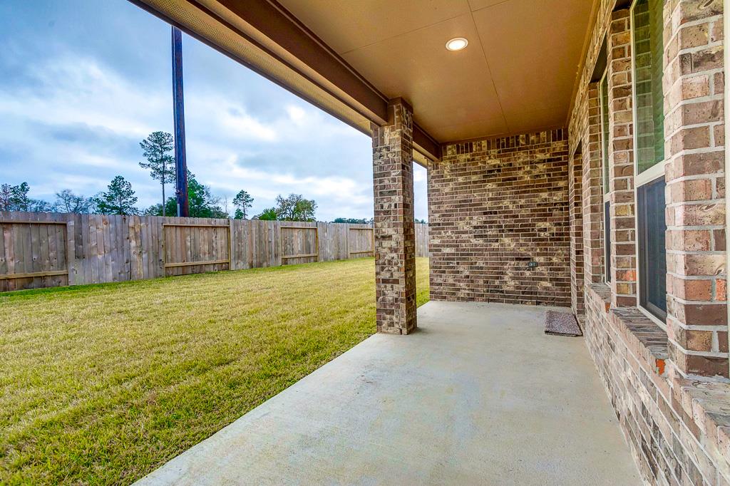 24314 North Newcastle Bay Trail Spring, TX 77389 - Photo 29 of 32 a view of an outdoor space with swimming pool