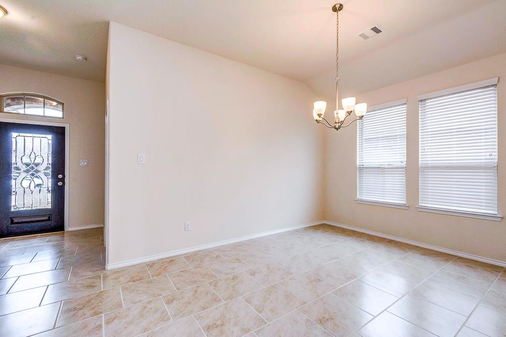 24314 North Newcastle Bay Trail Spring, TX 77389 - Photo 8 of 32 a view of an empty room with a window