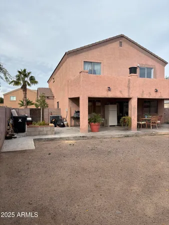 a front view of a house with a street