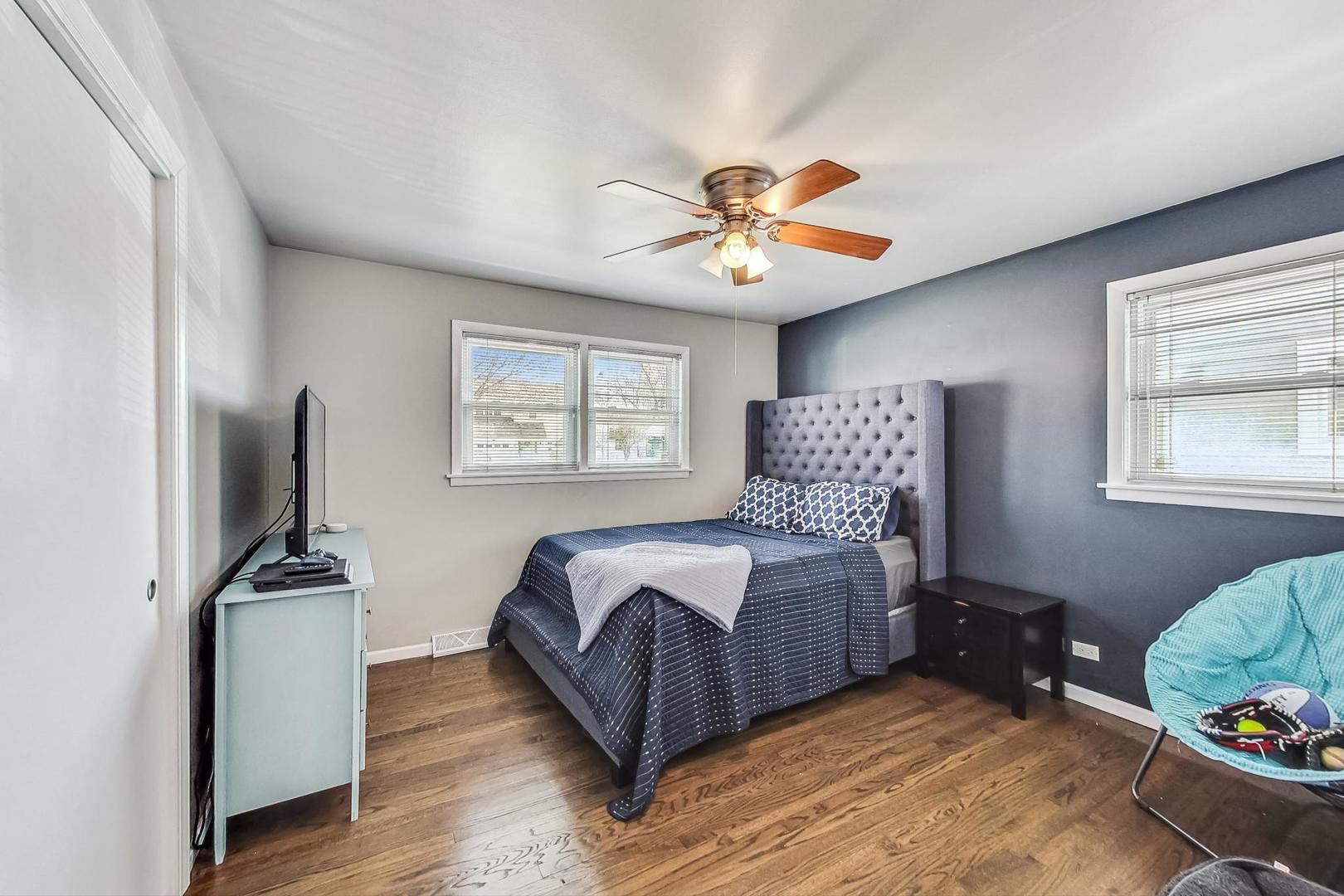 824 Florence Drive Park Ridge, IL 60068 - Photo 13 of 45 a bedroom with a bed and a window