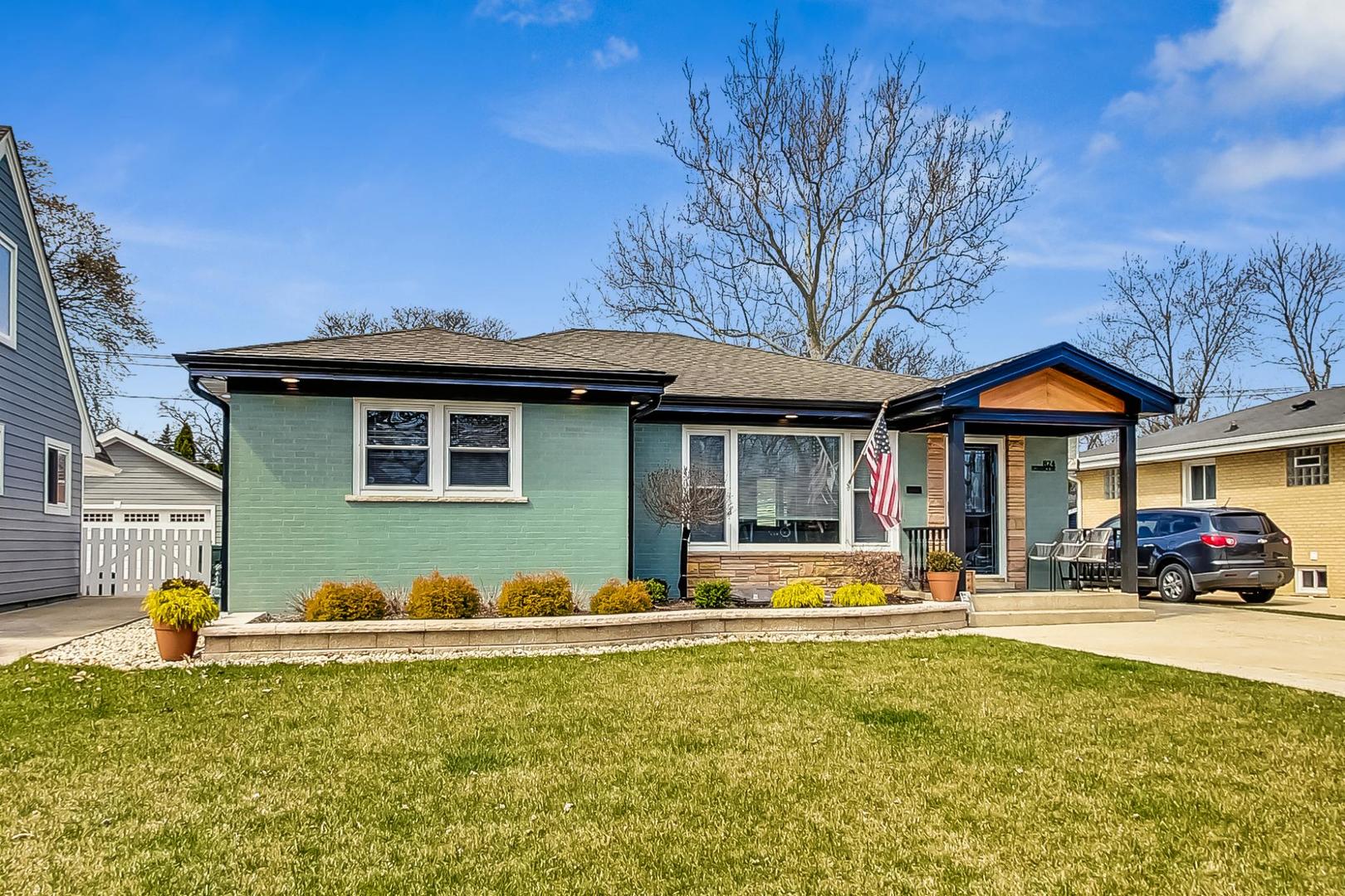 824 Florence Drive Park Ridge, IL 60068 - Photo 2 of 45 a front view of a house with garden