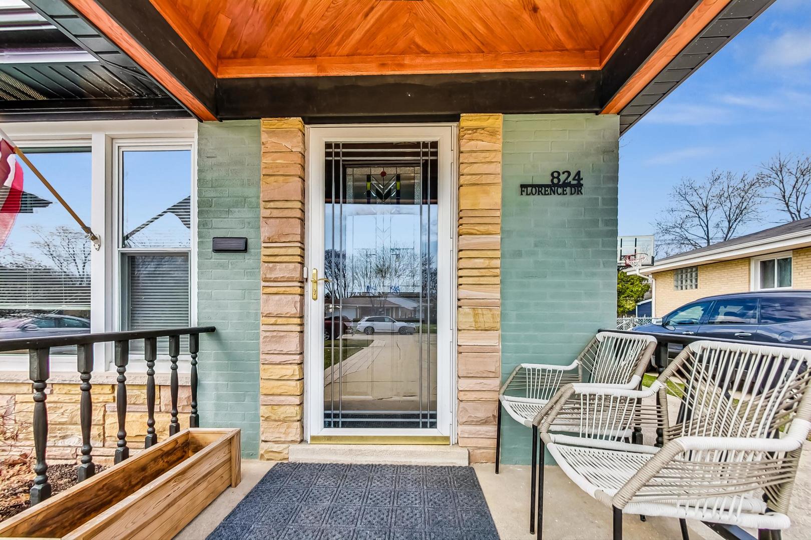 824 Florence Drive Park Ridge, IL 60068 - Photo 3 of 45 a view of front door of house with outdoor seating