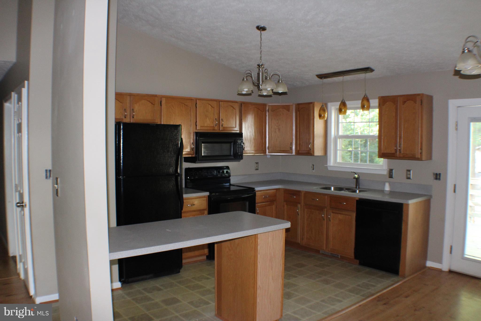 12103 Gringo Road Lusby, MD 20657 - Photo 6 of 17 Kitchen