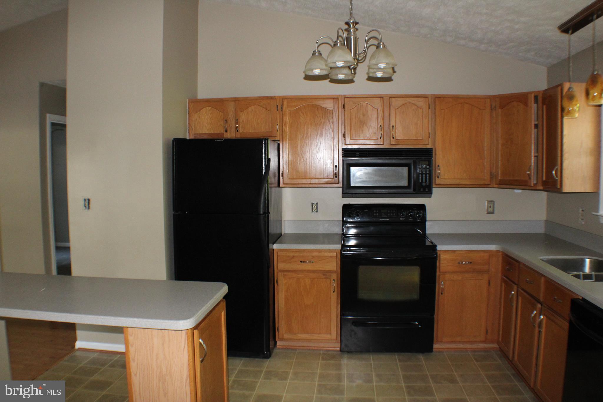 12103 Gringo Road Lusby, MD 20657 - Photo 7 of 17 Kitchen