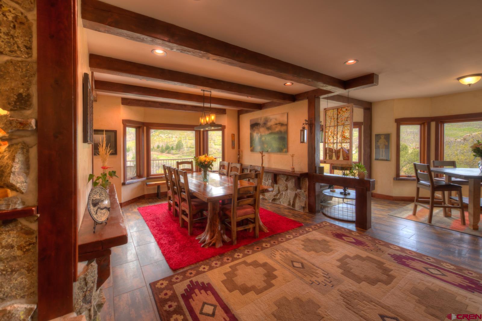 1833 Yellowstone Creek Road Walsenburg, CO 81089 - Photo 20 of 44 a living room with furniture rug and wooden floor