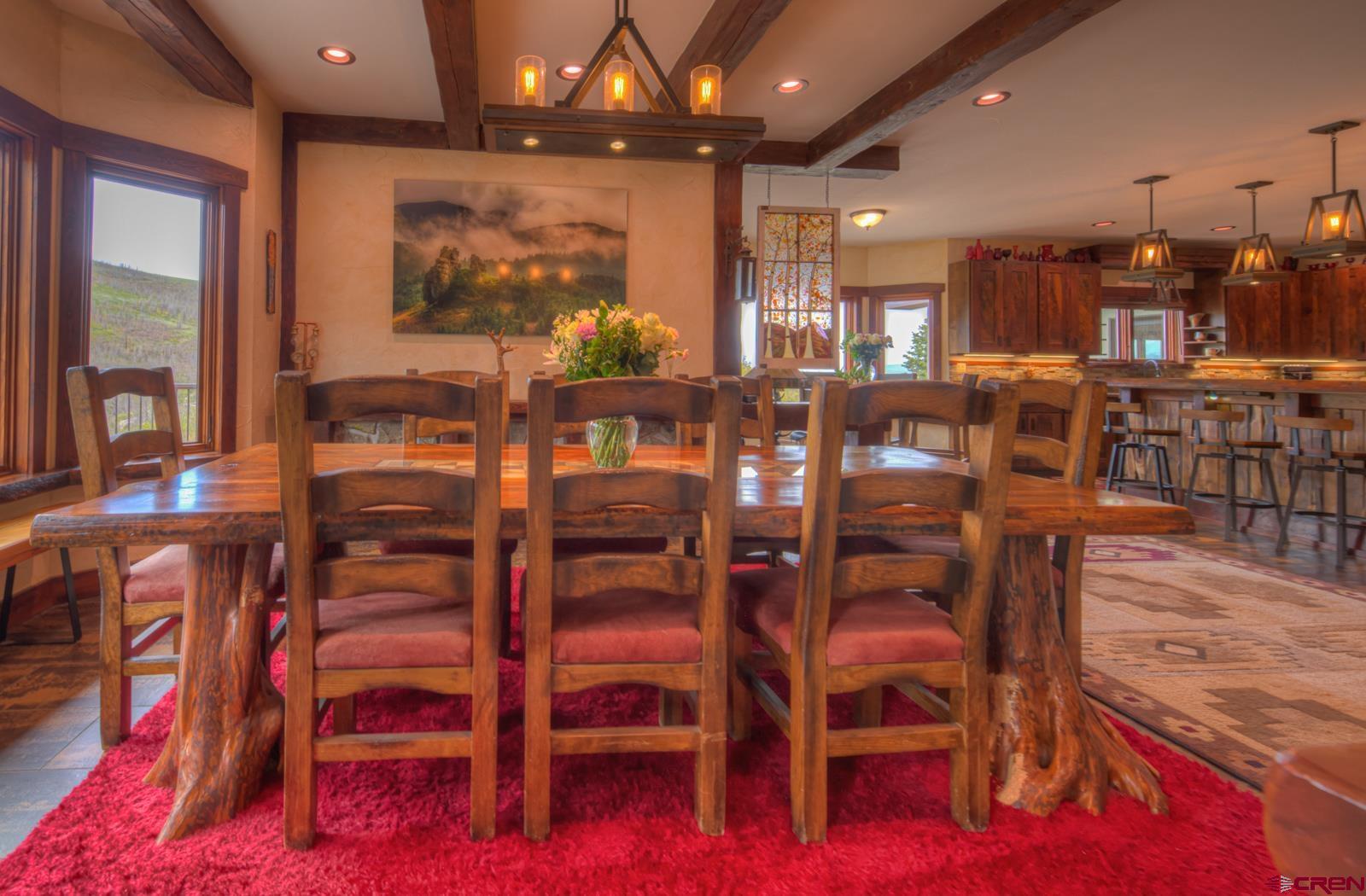 1833 Yellowstone Creek Road Walsenburg, CO 81089 - Photo 21 of 44 a view of a dining room with furniture