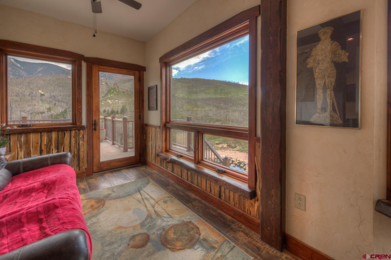 1833 Yellowstone Creek Road Walsenburg, CO 81089 - Photo 23 of 44 a living room with furniture and a window