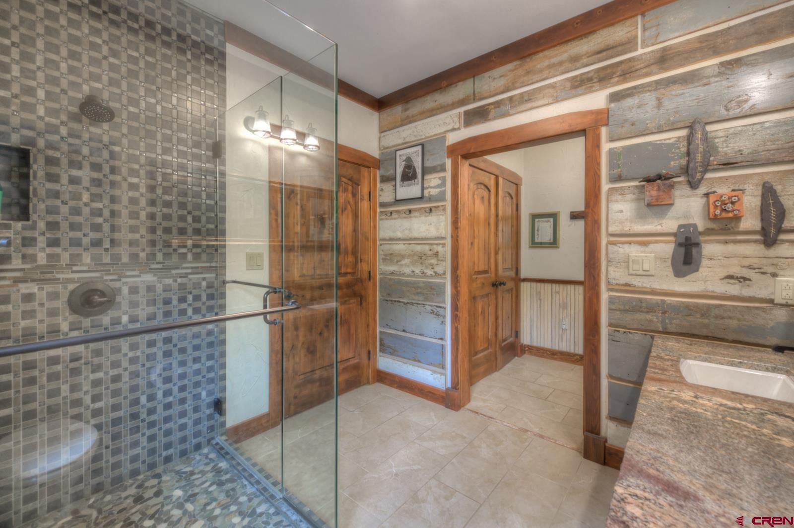 1833 Yellowstone Creek Road Walsenburg, CO 81089 - Photo 34 of 44 a bathroom with a shower and a sink
