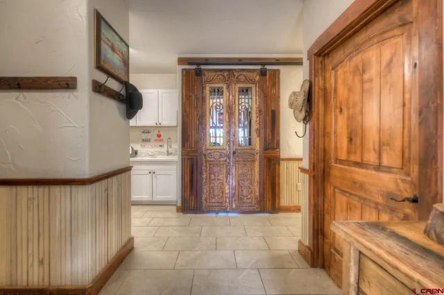 a room with furniture and wooden floor