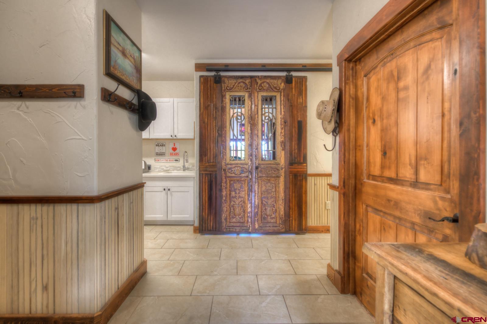 1833 Yellowstone Creek Road Walsenburg, CO 81089 - Photo 35 of 44 a bathroom with a tub and shower