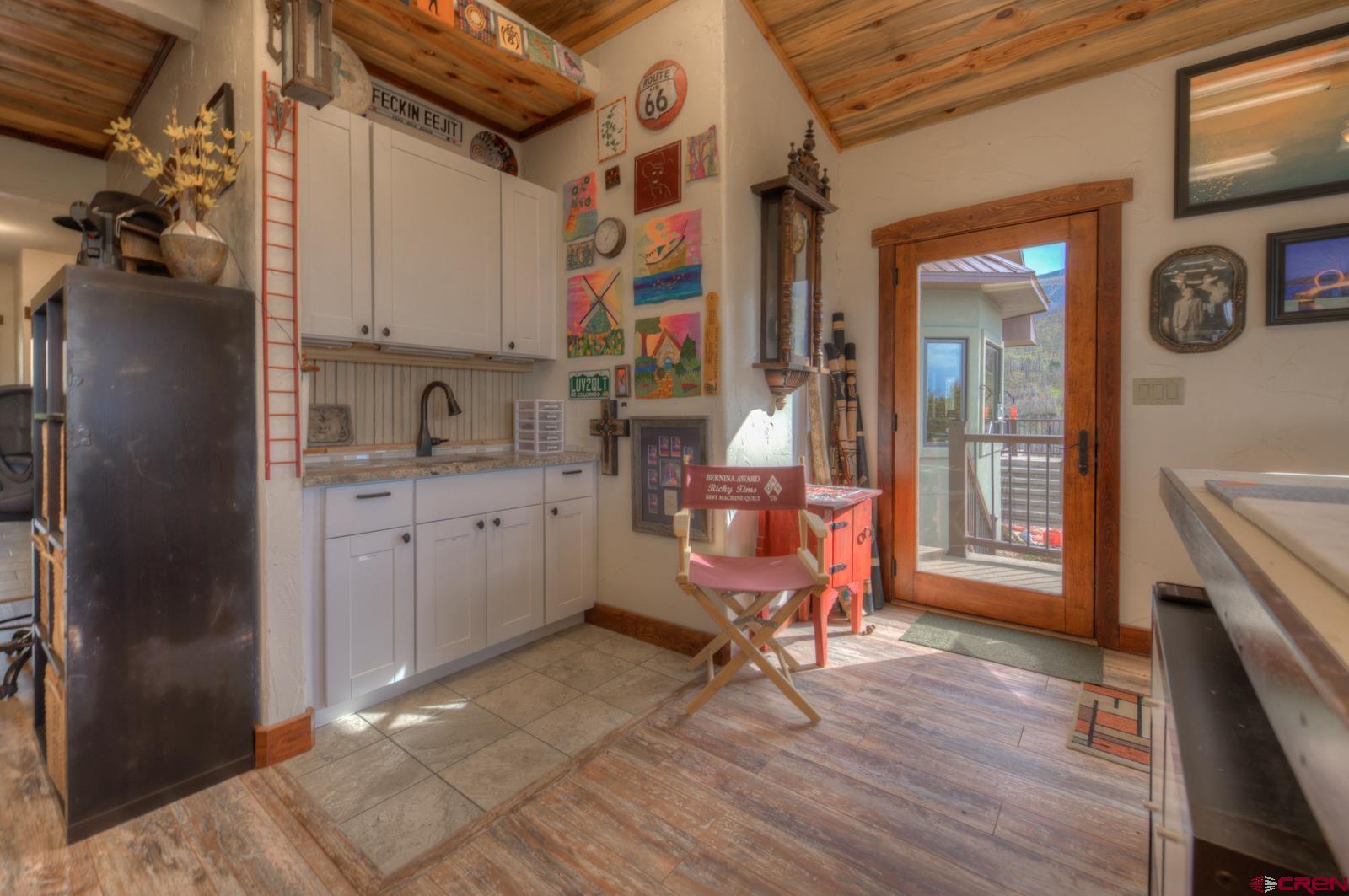 1833 Yellowstone Creek Road Walsenburg, CO 81089 - Photo 39 of 44 a view of a kitchen with a sink and cabinets