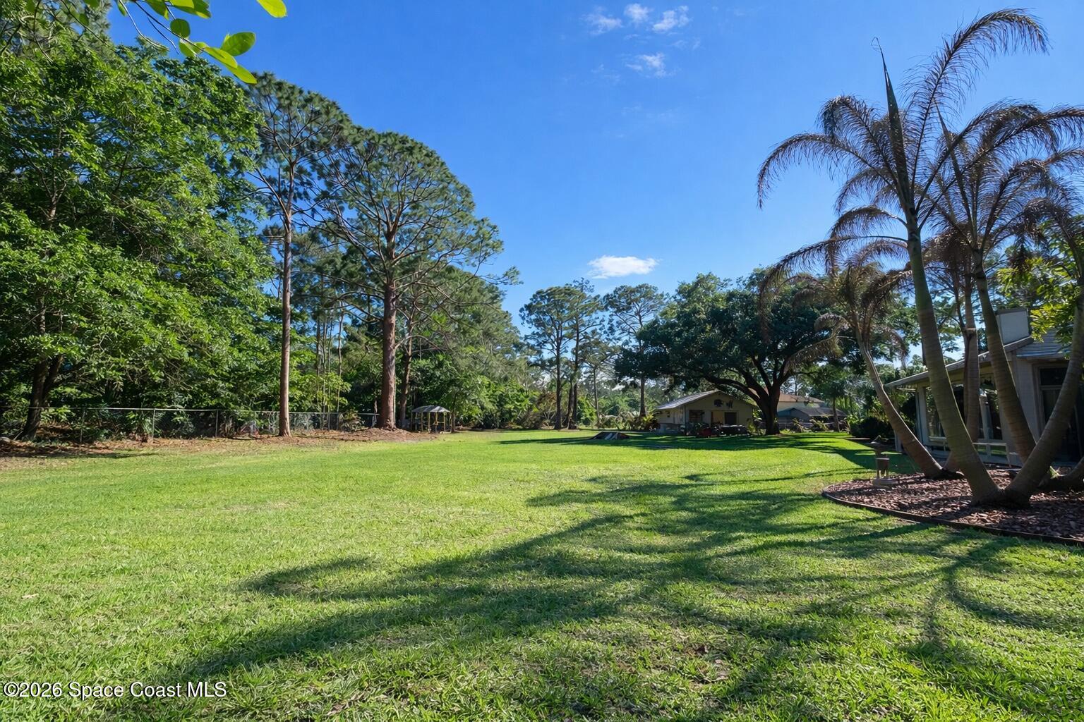 1527 Willard Road Northwest Palm Bay, FL 32907 - Photo 3 of 4 Backyard