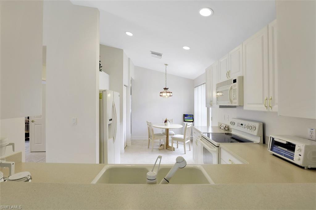 1759 Ribbon Fan Lane Naples, FL 34119 - Photo 5 of 30 Gallery Image 5