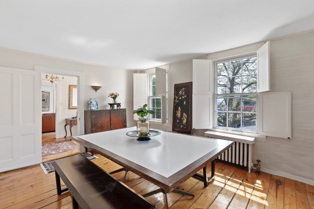 80 Front Street Marblehead, MA 01945 - Photo 13 of 42 a view of a dining room with furniture and window