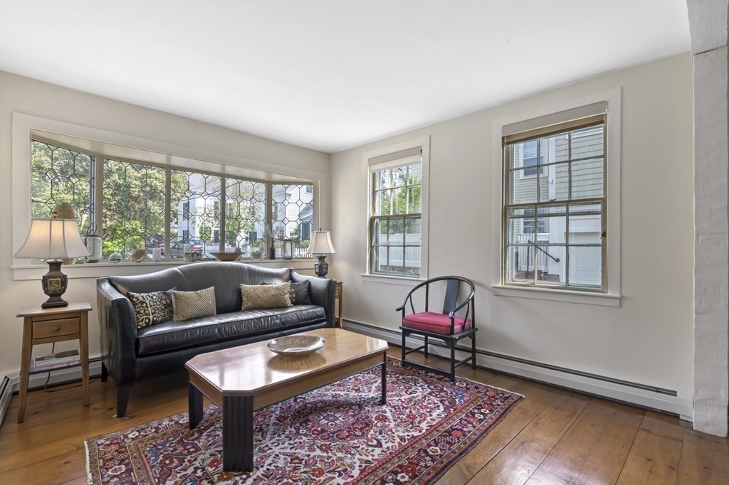 80 Front Street Marblehead, MA 01945 - Photo 17 of 42 a living room with furniture and a window