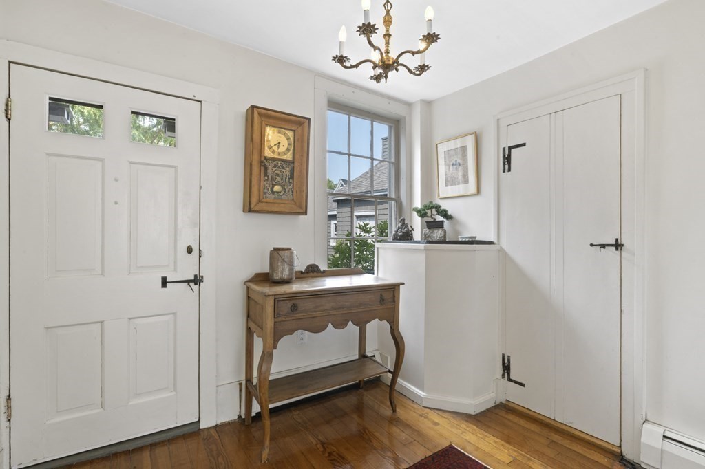 80 Front Street Marblehead, MA 01945 - Photo 19 of 42 a view of a livingroom with furniture wooden floor and window